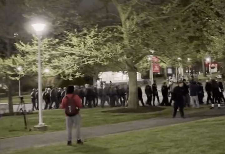 New York State Troopers charge in to arrest Stony Brook protesters. [Photo: Josh Dubnau]